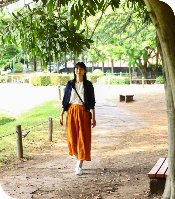Lady walking on a trail
