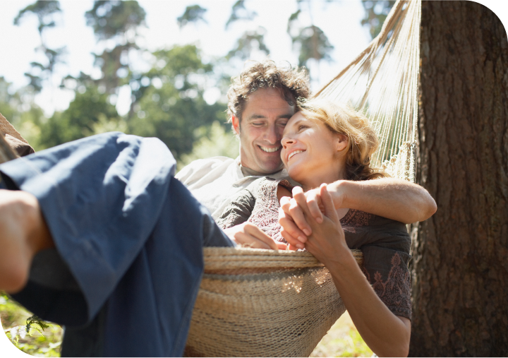 People hugging hammock